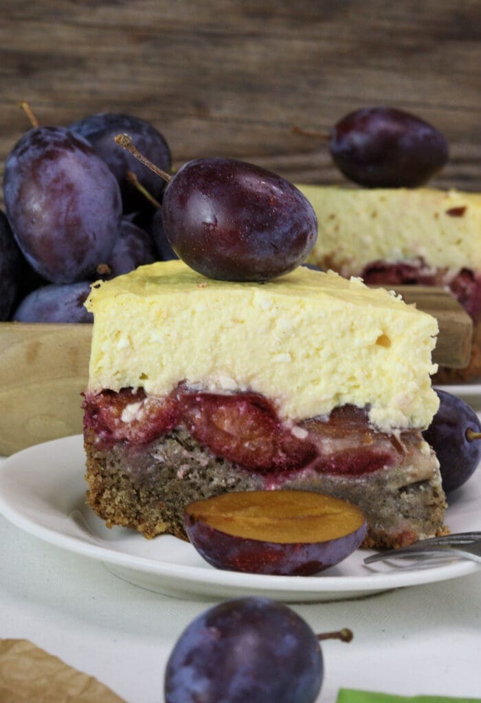 A deliciously looking slice of rich plum cheesecake.